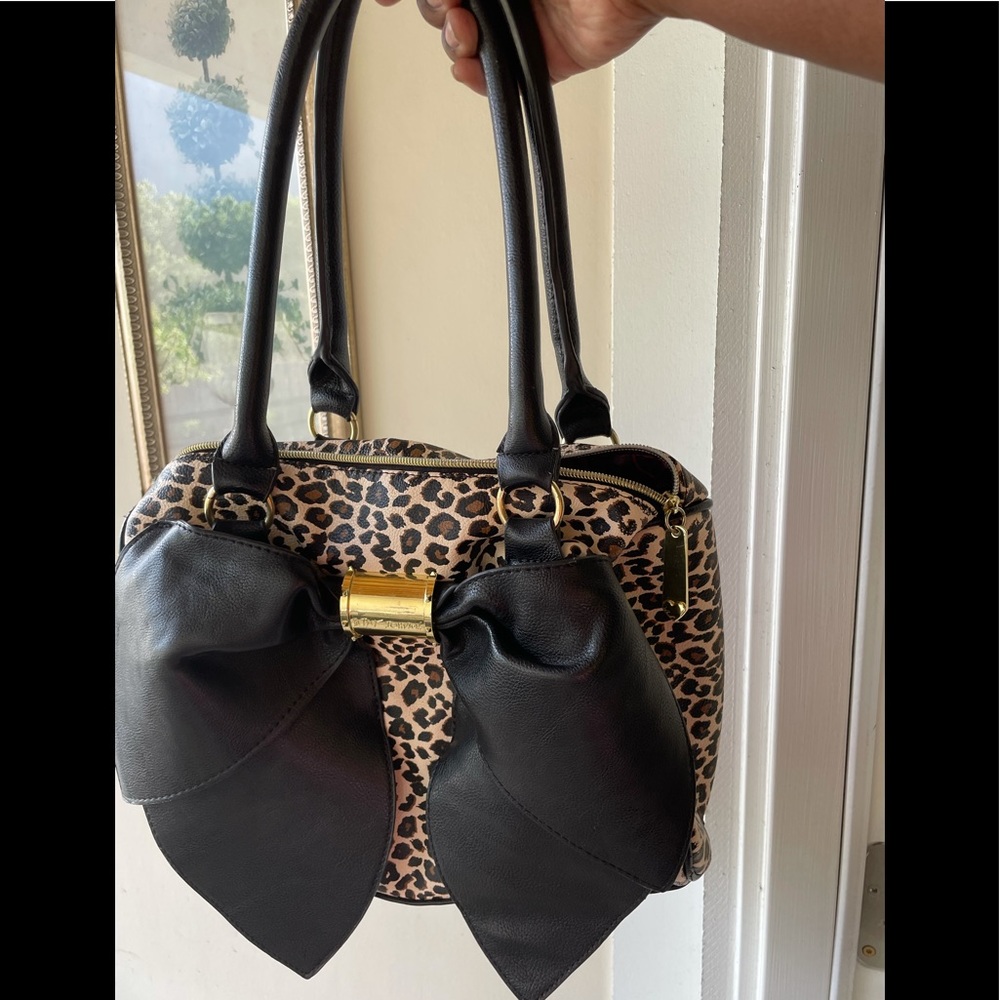 Betsey Johnson cheetah print bowler
